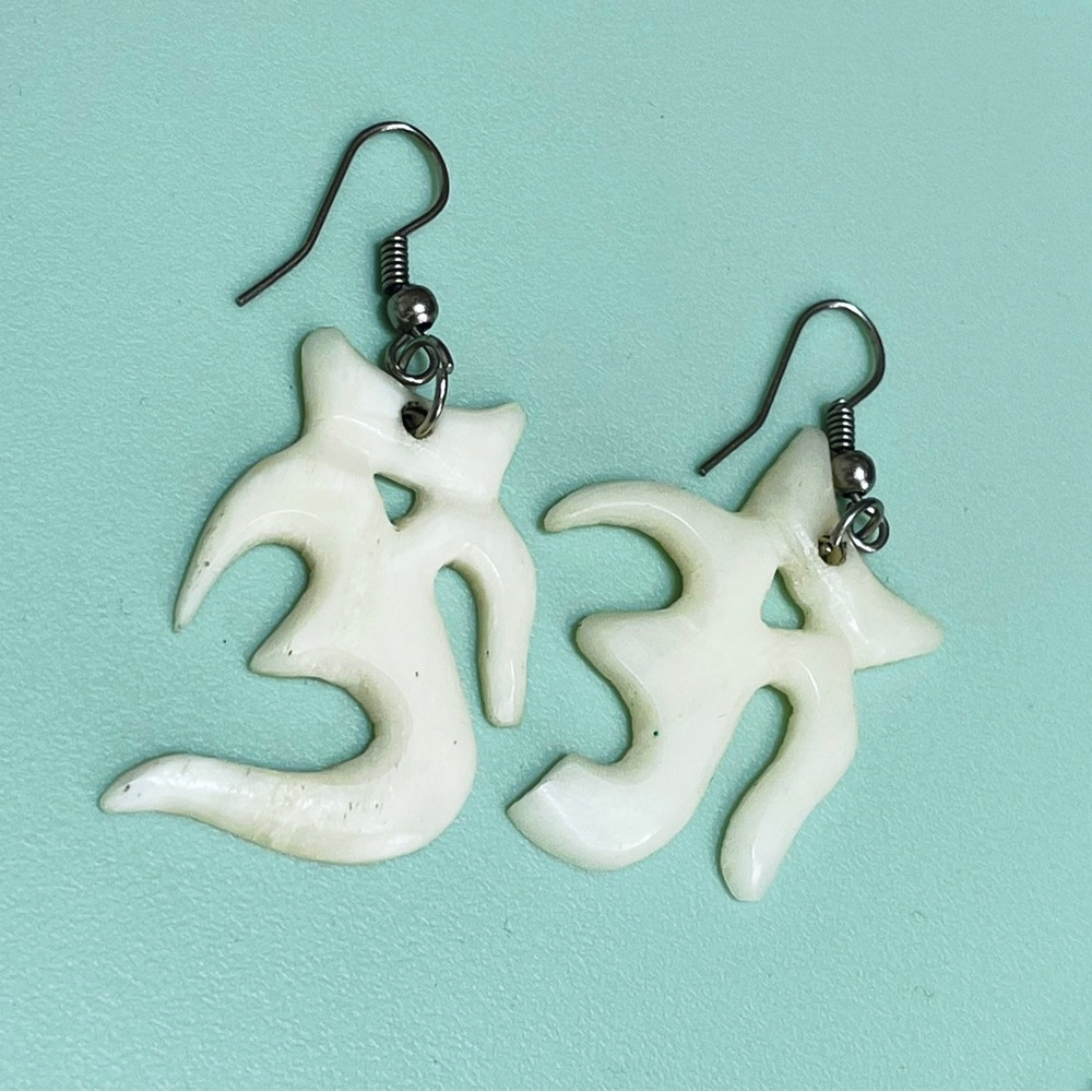 Off white color Ohm symbol earrings